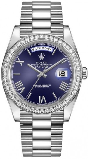 Montre Rolex Day-Date 40 en or blanc avec lunette en diamant pour hommes 228349RBR